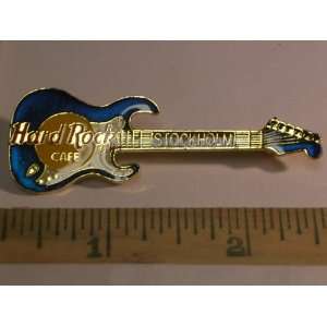 Hard Rock Cafe Guitar Pin, Stockholm Yellow, Blue, Red & Gold Guitar 