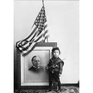   in front of flag draped, head and shoulders, portrai