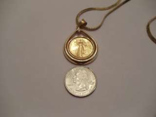gold coin diamond and fourteen karat gold pendant necklace the pear 