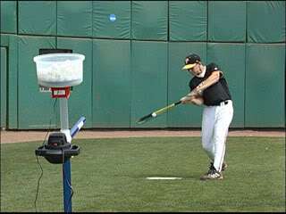 Grand Slam® Baseball Wiffle Golf Ball Pitching Machine  