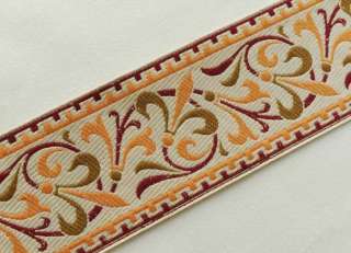 ribbon trim with jacquard woven, fleurs de lis pattern. Burgundy 