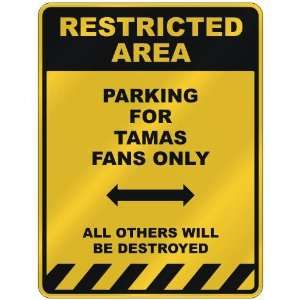  RESTRICTED AREA  PARKING FOR TAMAS FANS ONLY  PARKING 