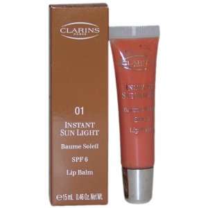 Instant Sun Light Lip Balm SPF 6 No 1 Sunset Bronze By Clarins for 