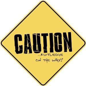   CAUTION  RUTLEDGE ON THE WAY  CROSSING SIGN