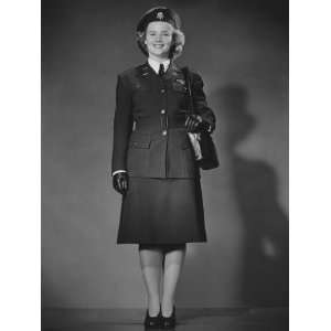 Woman in World War II Military Uniform Posing in Studio Photographic 