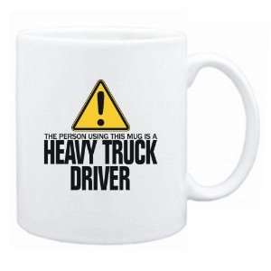  New  The Person Using This Mug Is A Heavy Truck Driver 