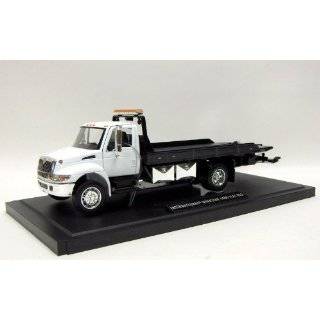   Dura Star 4400 Flat Bed Tow Truck 1/24 White: Toys & Games