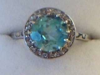 1920S OR 30S SOLID PLATINUM LADIES RING INSET WITH A BLUE STONE 