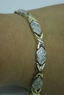   14K SOLID YELLOW AND WHITE GOLD WITH DIAMONDS X AND O BRACELET  