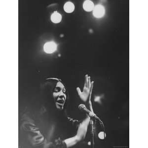 Cree Indian Folk Singer Buffy Sainte Marie, During a Concert Stretched 